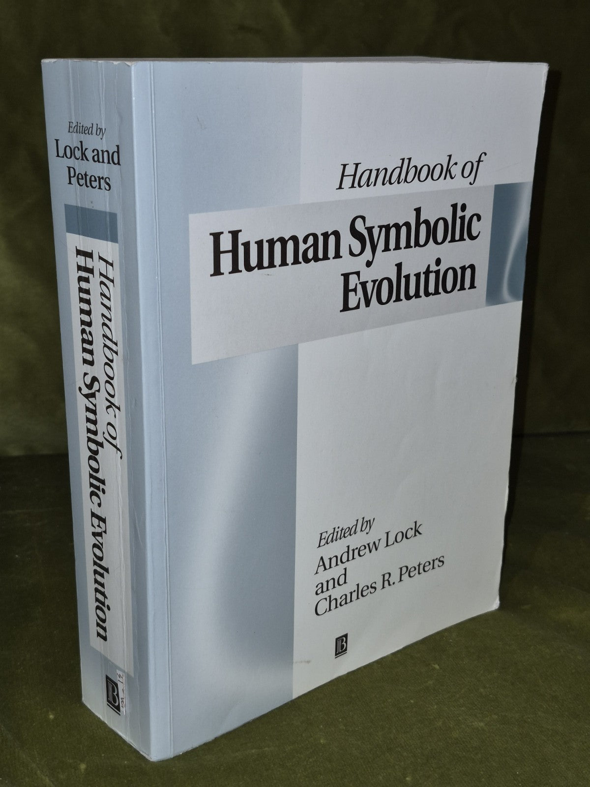 The Handbook of Human Symbolic Evolution by Charles R. Peters 19990