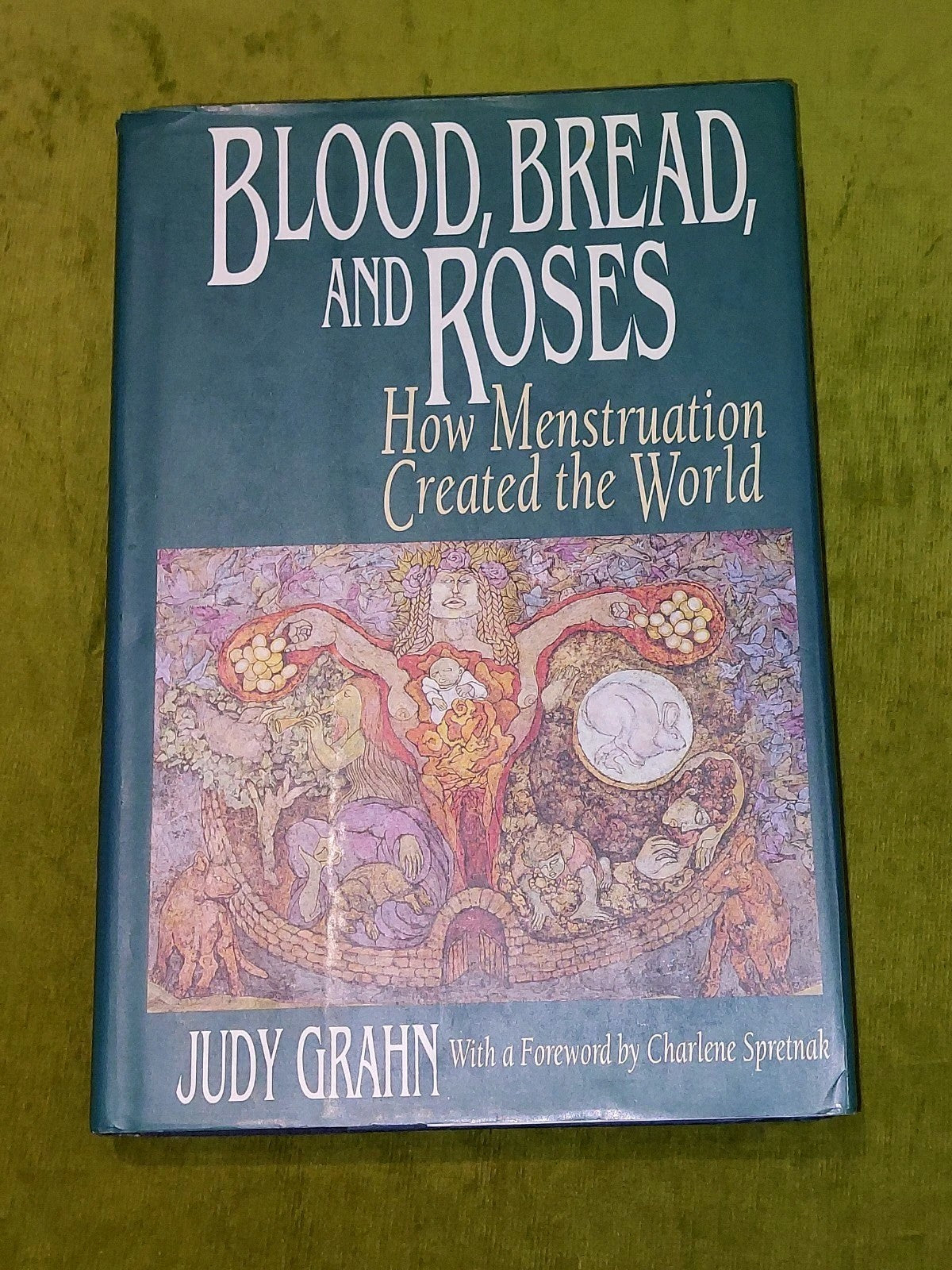 Blood, Bread, and Roses: How Menstruation Created the World Judy Grahn HB (1993)0